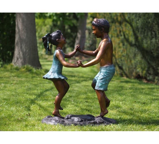                                                               bronzen-beeld-jongen-en-meisje-dansend