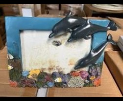 poly fotokader met dolfijnen